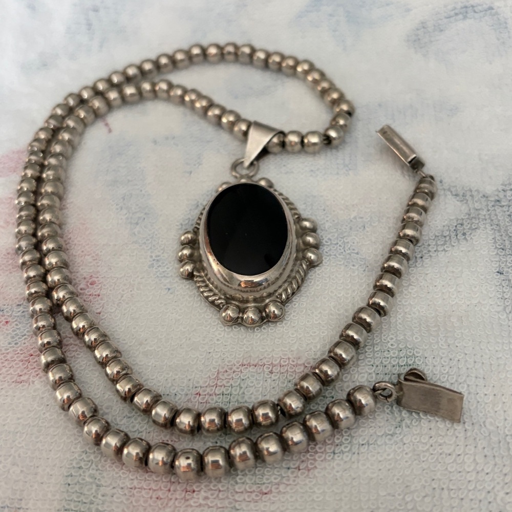 Elegant sterling Silver and Black Pendant Necklace.